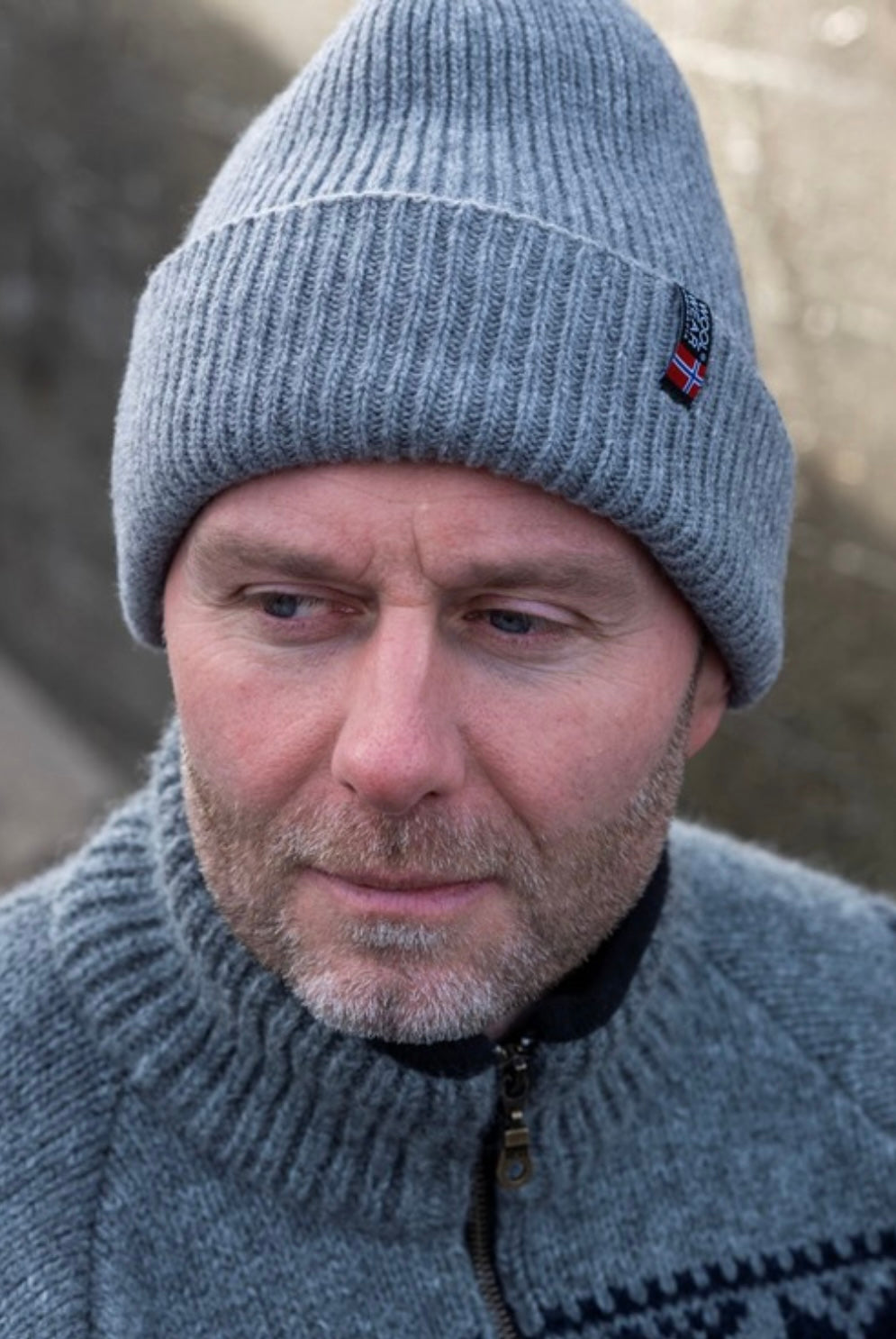 Strikhue fra WOOLWEAR of Scandinavia 100% uld. - Grå
