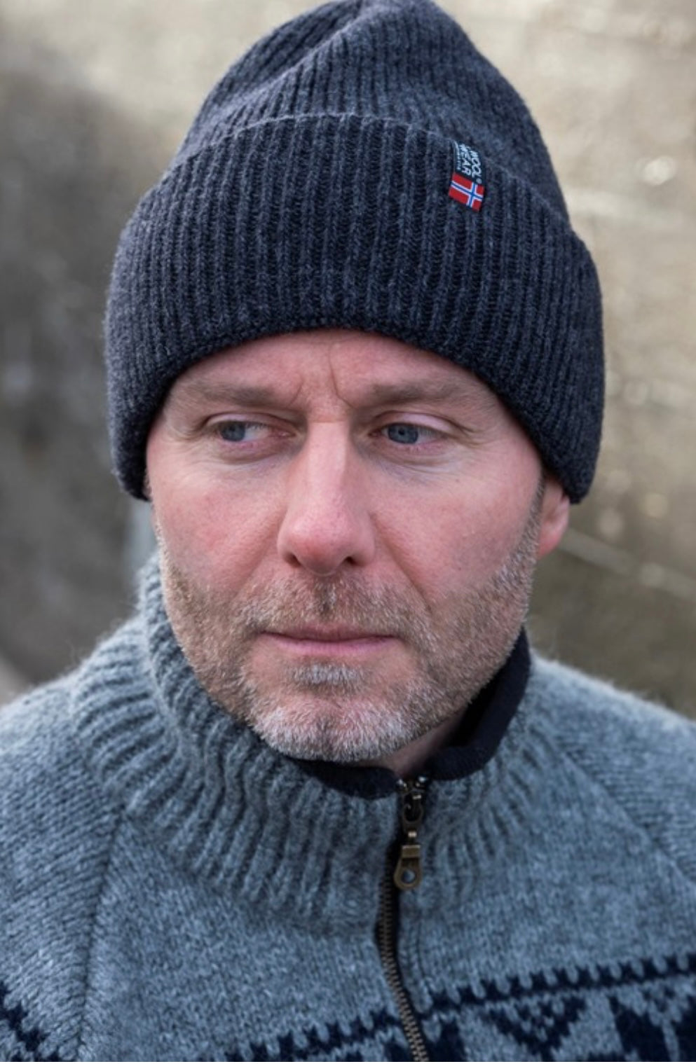 Strikhue fra WOOLWEAR of Scandinavia 100% uld. - Koks